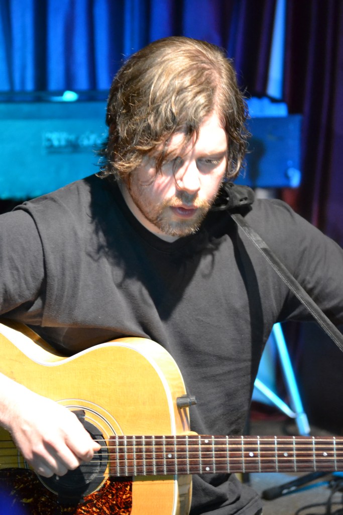 Dax Riggs Tuning His Guitar Pre-Show