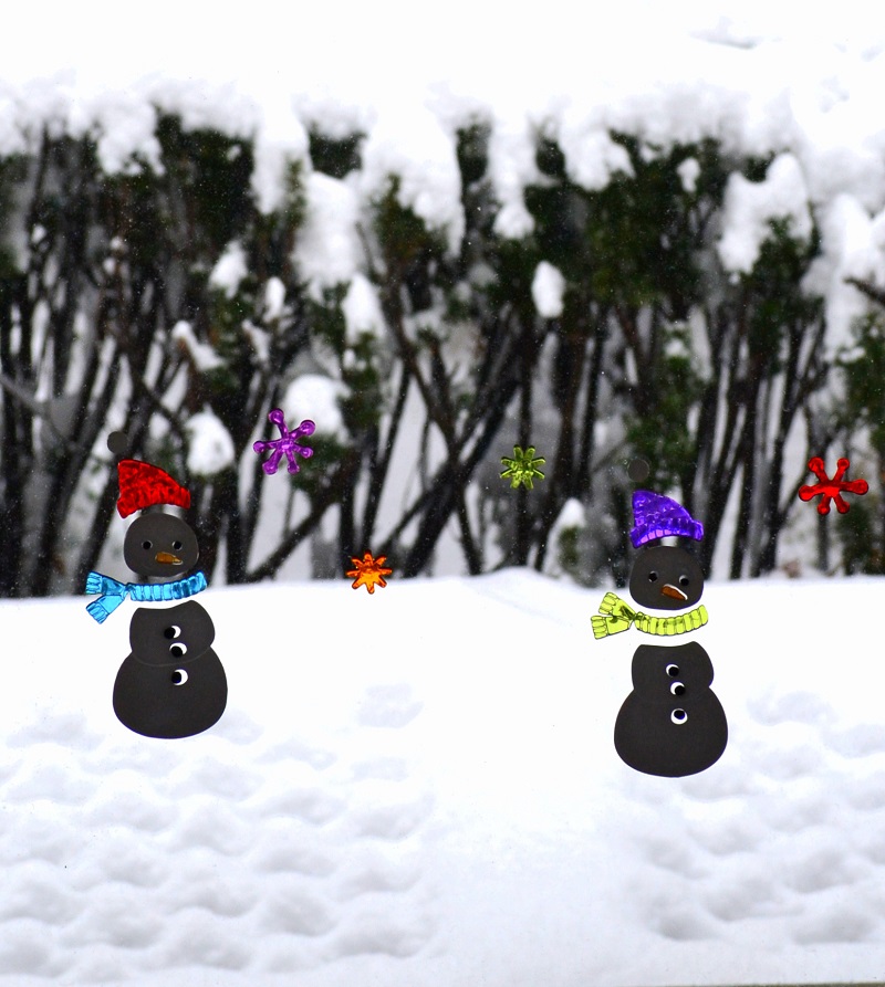 I affixed these snowmen decals to my front door in early December, but I suspect they've felt a little out-of-place until today. 