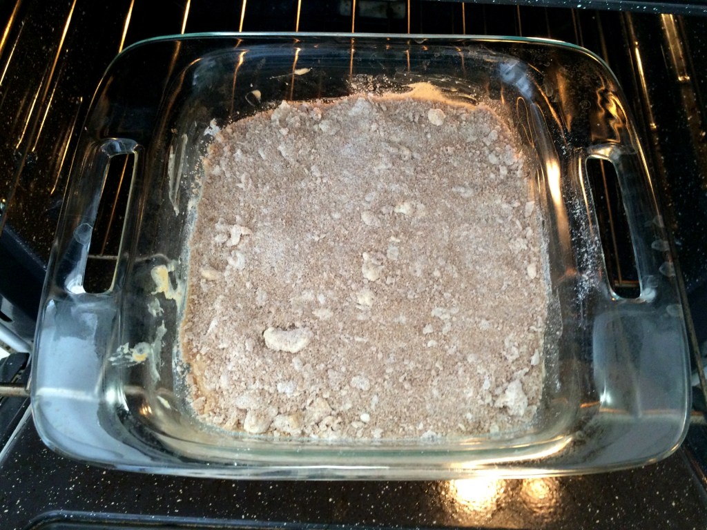 Sprinkle streusel mixture over the top of the batter. Bake the cake for 30 minutes, until it is golden and dry on top. 